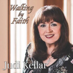 <p style="color: white;font-family: Times;font-size: 25px" align='center'> </p> <p align='center'>"Walking By Faith" </p> Album Cover - Judi Kellar - Walking By Faith